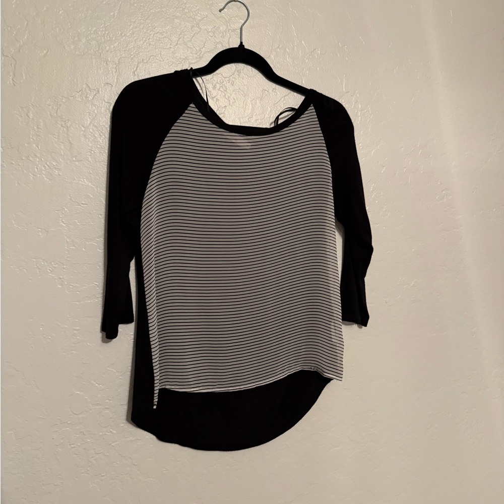 Three quarter length black and sheer striped shirt